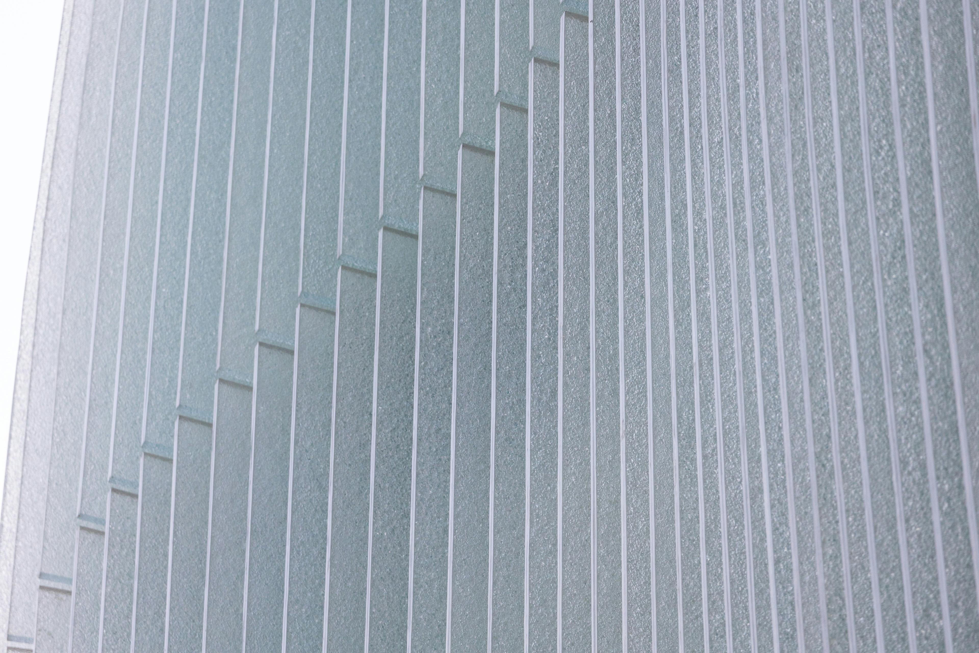 Modern building facade with repeating vertical lines