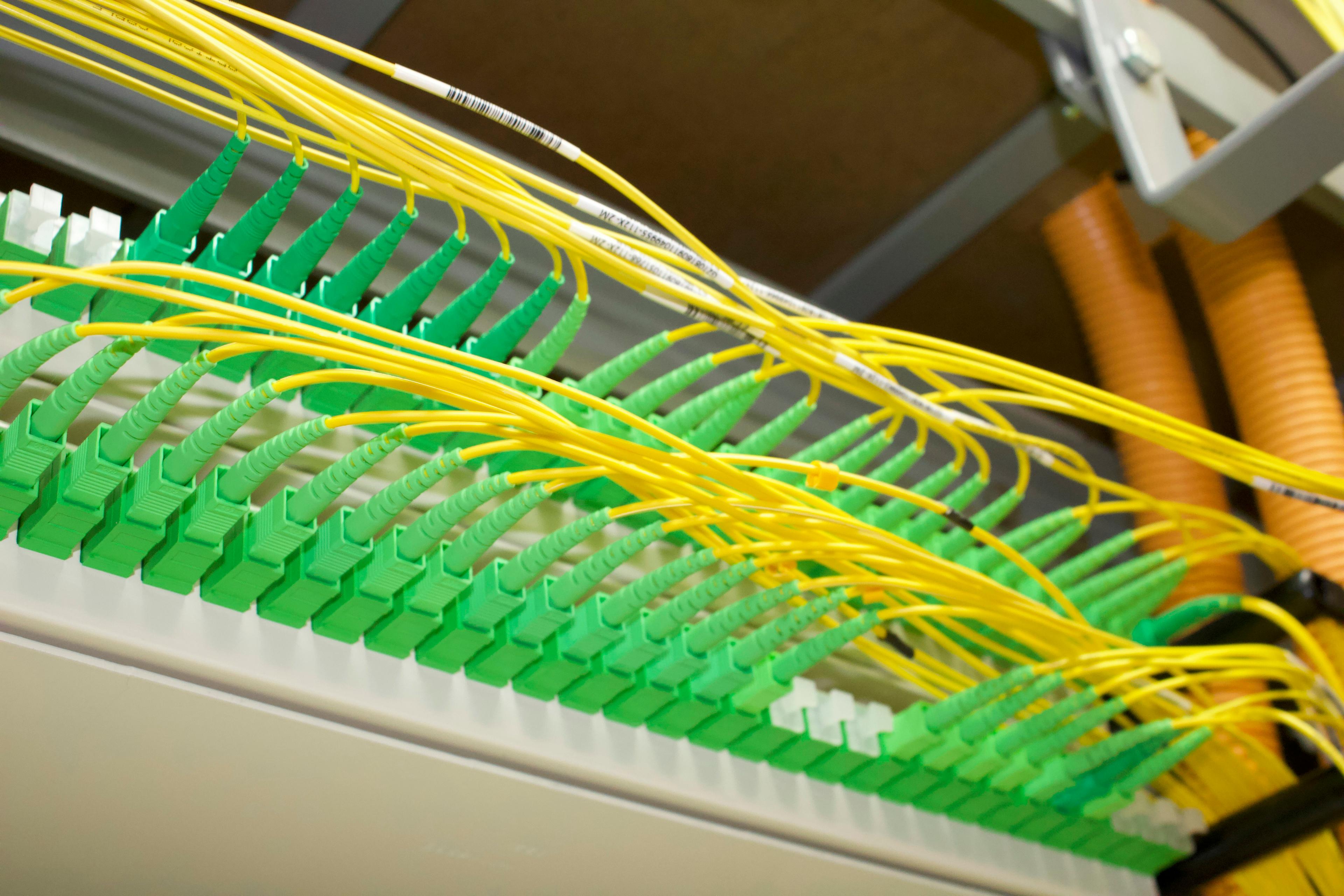 a bunch of yellow and green wires and wires